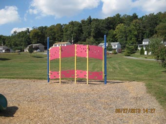 Woodbridge Park playground climbing wall